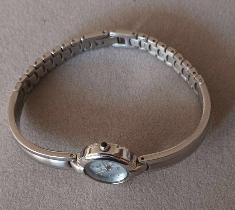 Lucent Watch. New. Needs Battery.