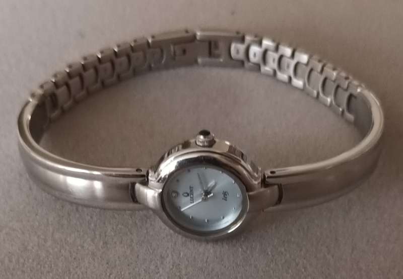 Lucent Watch. New. Needs Battery.