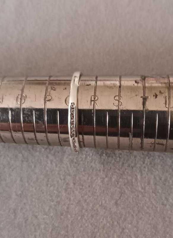 Sterling Silver Half Eternity Rings x2. 2.1g. Size N & size O.