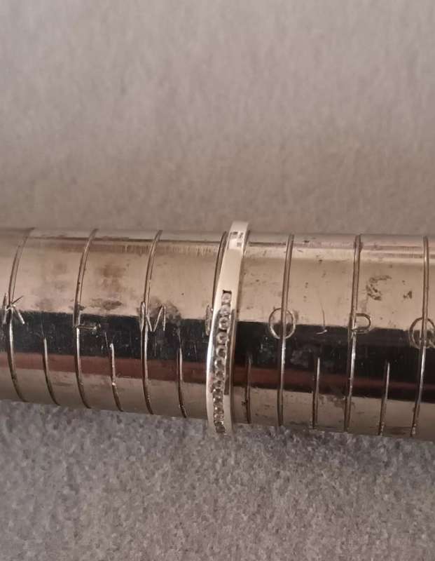 Sterling Silver Half Eternity Rings x2. 2.1g. Size N & size O.