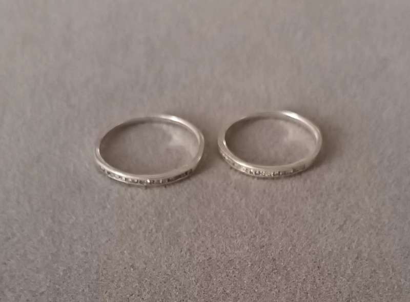 Sterling Silver Half Eternity Rings x2. 2.1g. Size N & size O.