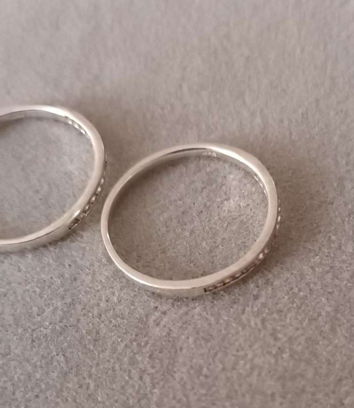 Sterling Silver Half Eternity Rings x2. 2.1g. Size N & size O.