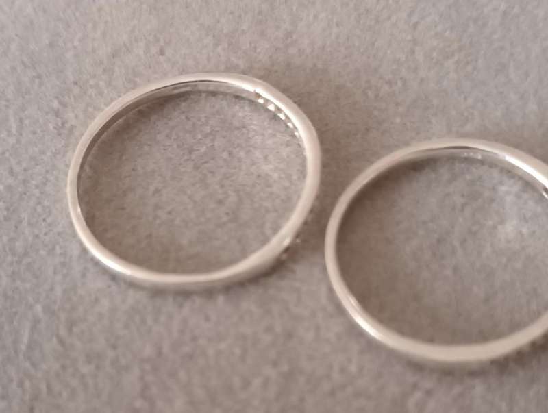 Sterling Silver Half Eternity Rings x2. 2.1g. Size N & size O.