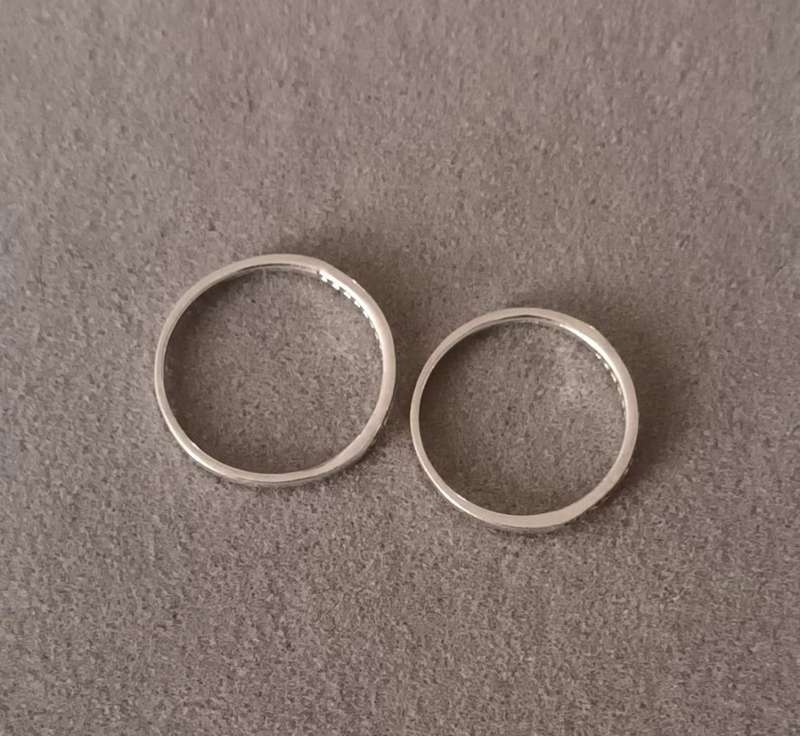 Sterling Silver Half Eternity Rings x2. 2.1g. Size N & size O.