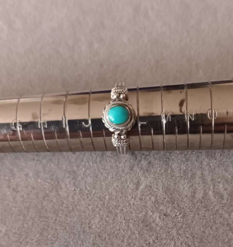 Sterling Silver Ring with Turquoise Stone. 2g. Size K.