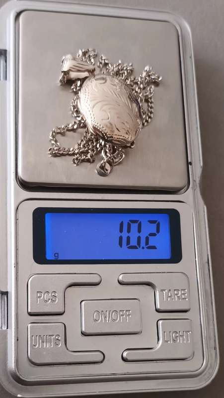 Sterling Silver Necklace with Locket Pendant.  10.2g. 60cm.
