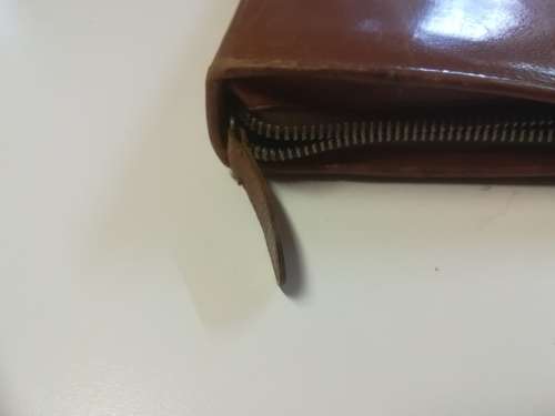 ***Rare***Vintage Genuine Leather Zipper Folder with hinges. Length 27.5cm. Width 21cm.