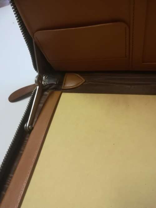 ***Rare***Vintage Genuine Leather Zipper Folder with hinges. Length 27.5cm. Width 21cm.