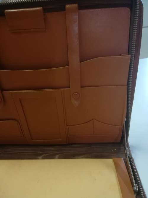 ***Rare***Vintage Genuine Leather Zipper Folder with hinges. Length 27.5cm. Width 21cm.