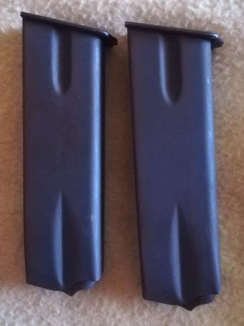Genuine Leather Double Magazine Holster with 2x Magazines for 9mm pistol.