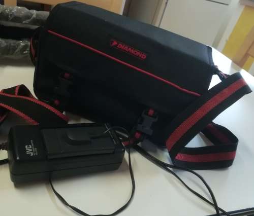 JVC VIDEO CAMERA MODEL GR - AX860. COMES WITH TRIPOD AND CARRY CASE & REMOTE CONTROL.