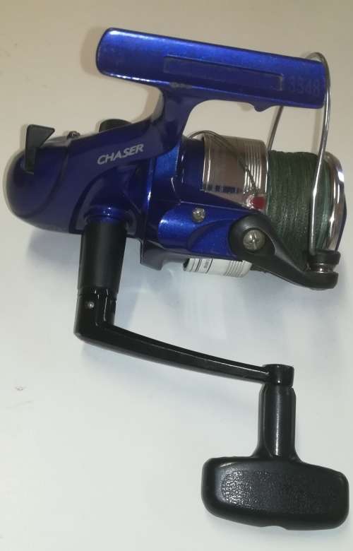 Large Okuma Chaser AX-65 fishing reel. Like new. With line & braid on.