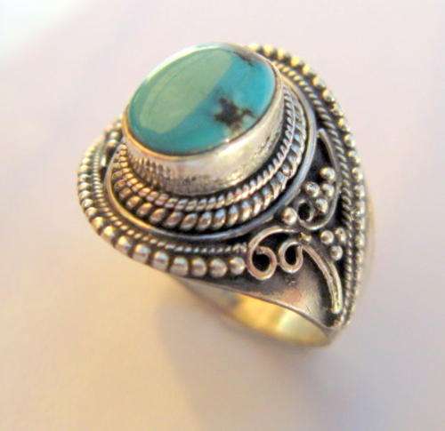 Solid Sterling silver with teardrop natural turquoise