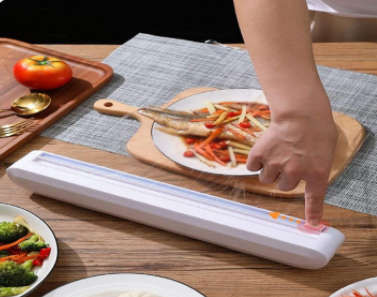 HOUSEHOLD FILM CUTTER