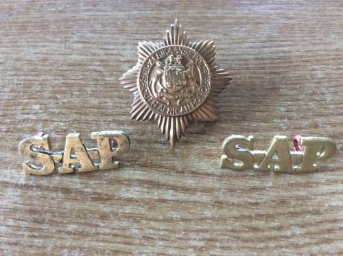 South African Police cap badge and shoulder titles
