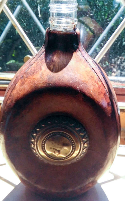Scottish leather clad haig pinch bottle