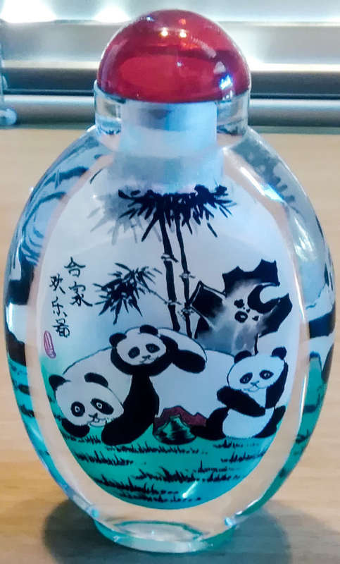 Glass oriental snuff bottle