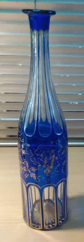 Bohemian style cut glass bottle