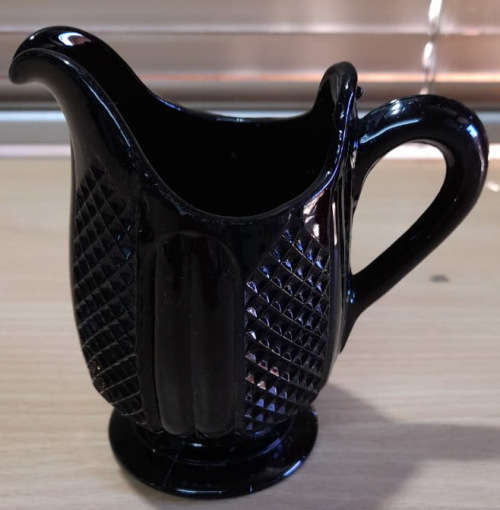 Victorian style black glass jug