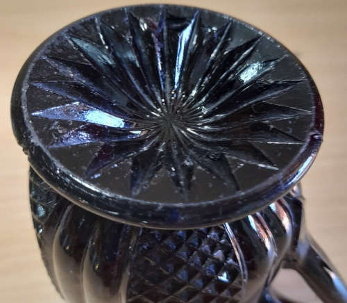Victorian style black glass jug