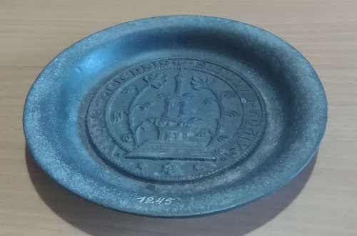 Latin inscribed metal dish