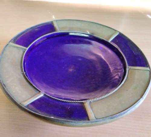 Cladded pottery dish