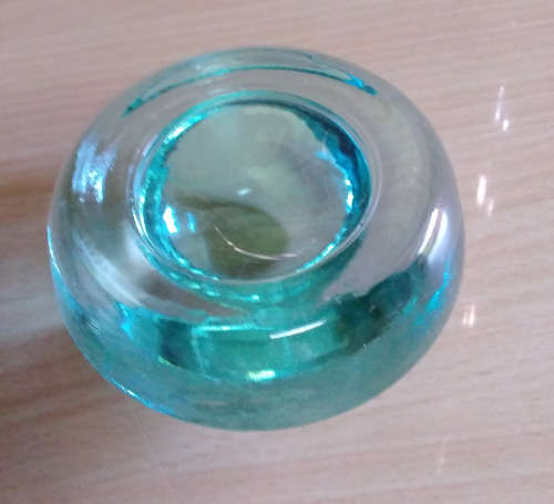 Glass cats eye paperweight