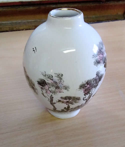 Small hand painted vase. Signed