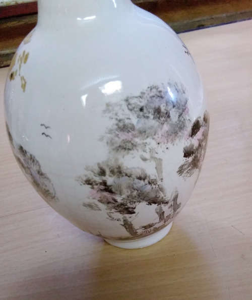 Small hand painted vase. Signed