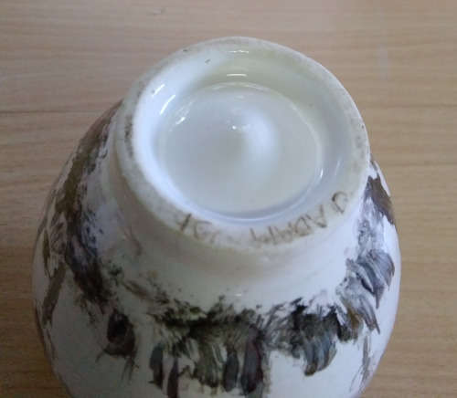 Small hand painted vase. Signed