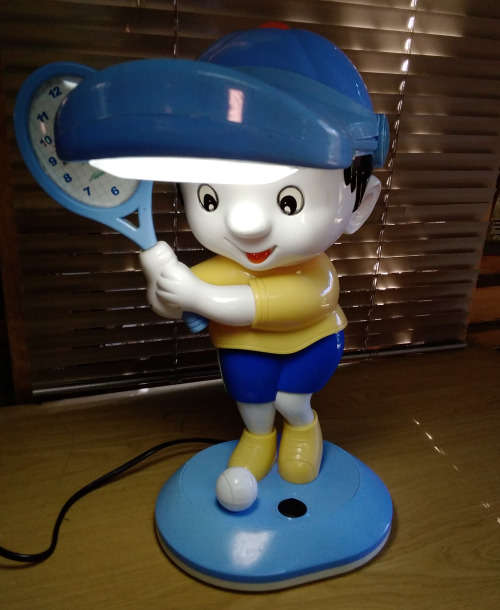 Bedside lamp with clock