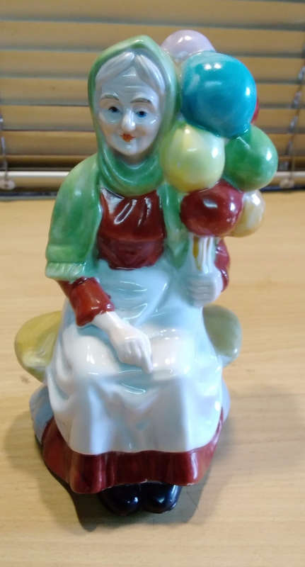 Balloon lady figurine