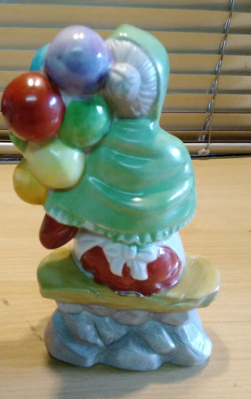 Balloon lady figurine