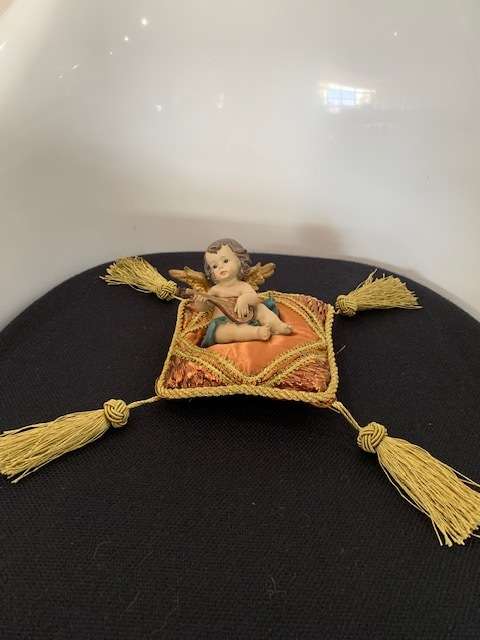 CHERUB PLAYING THE MANDOLIN SITTING ON GOLD BRAIDED CUSHION