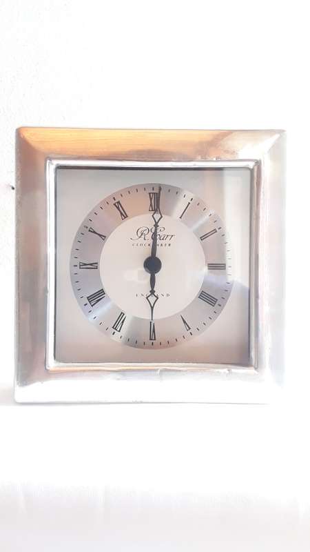 R Carr silver clock