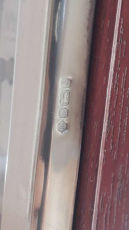 R Carr silver clock