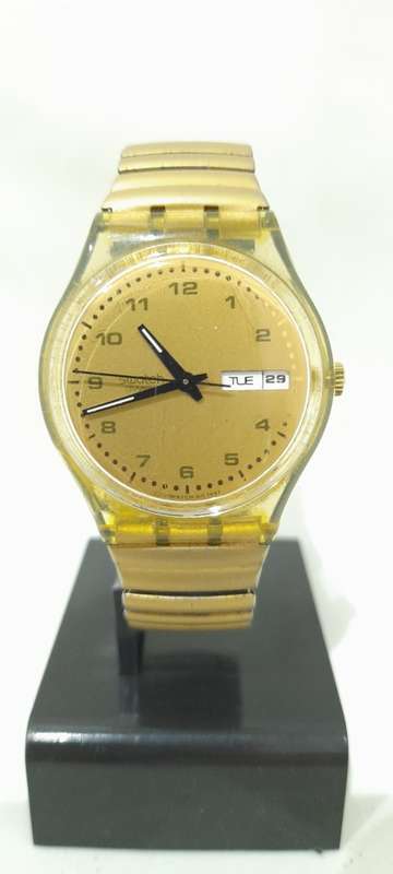 Swatch men`s quartz watch