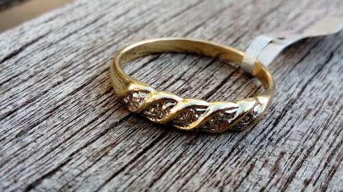 9ct Yellow & White Gold woven ring set with 5 Diamonds.