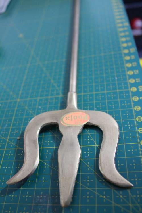 Brass Trident
