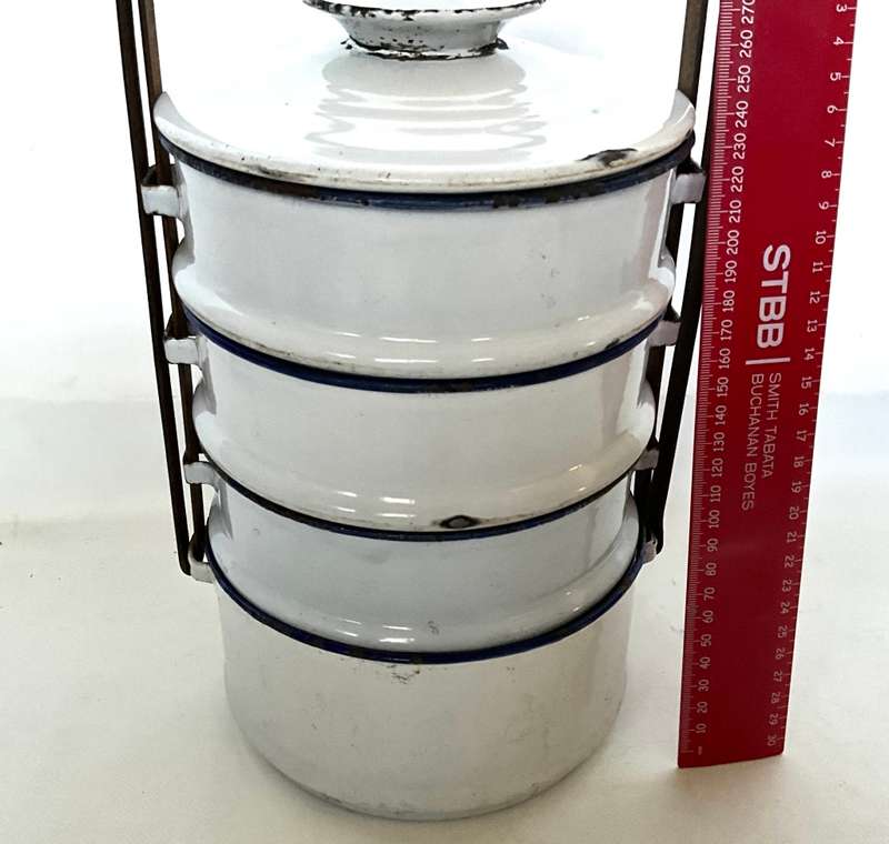 A vintage Tiffin lunchbox (4 layers)