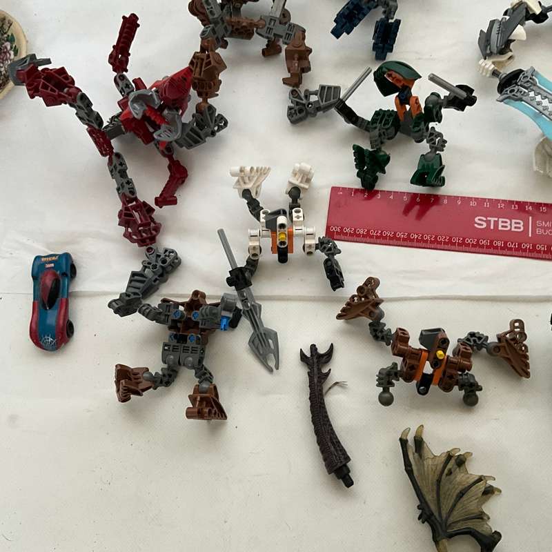 Very large odds bag of toys, toy parts, and various Lego pieces and accessories