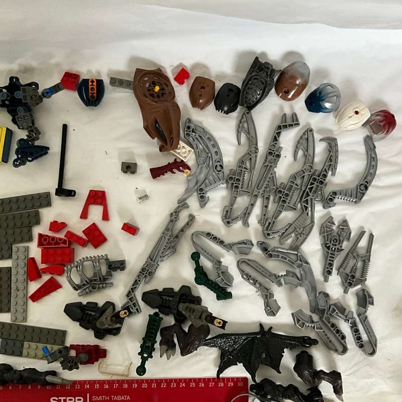 Very large odds bag of toys, toy parts, and various Lego pieces and accessories