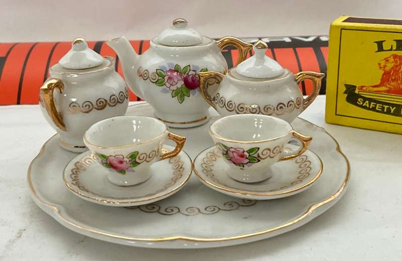 Exquisitely fine dolls house floral porcelain tea for two