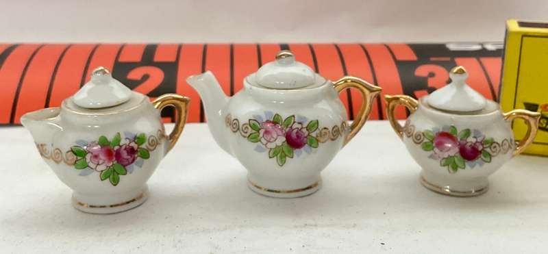 Exquisitely fine dolls house floral porcelain tea for two