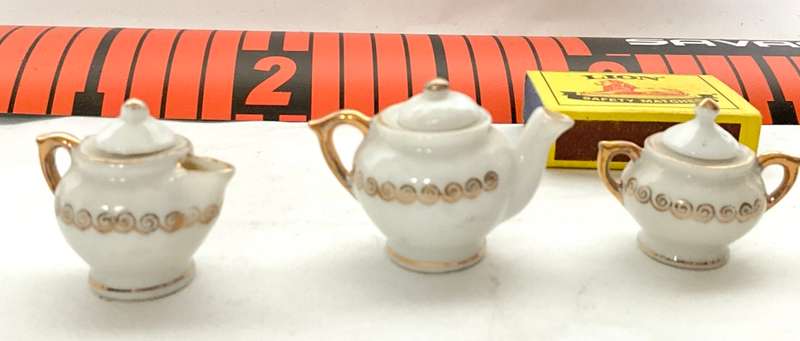 Exquisitely fine dolls house floral porcelain tea for two