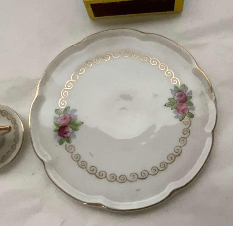 Exquisitely fine dolls house floral porcelain tea for two