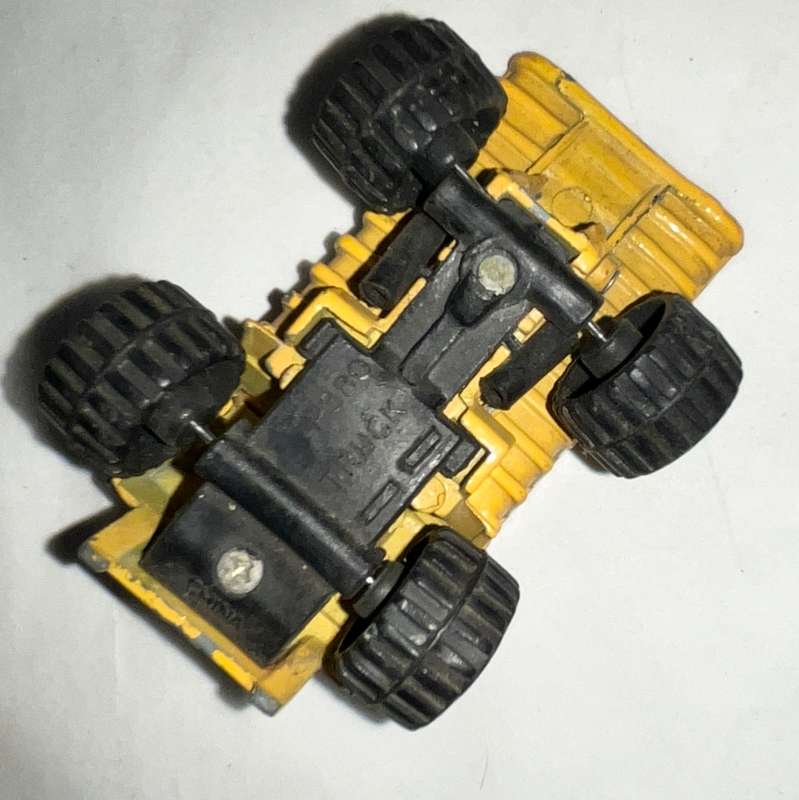 Assorted three toy cars, including a Monster Jam model