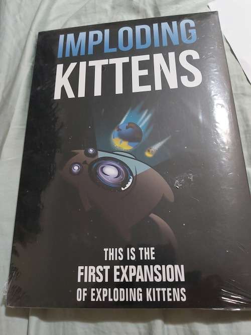 Exploding Kittens card game with expansion pack