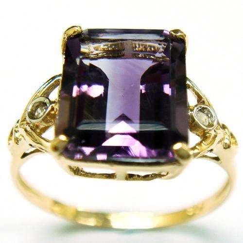 Beautiful solid 9kt gold and genuine amethyst and diamond ring.