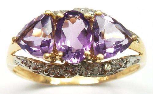 Beautiful solid 9kt gold and genuine amethyst and diamond ring.